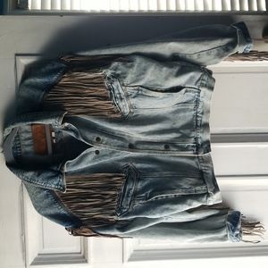 Vintage denim fringe jacket.